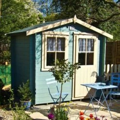 Shire Avesbury 2.5m X 1.8m Log Cabin Summerhouse (19mm) 18 Shire Avesbury 2.5m X 1.8m Log Cabin Summerhouse (19mm) -Garden Supplies Sales Shop aves0806l19 1aa avesbury summerhouse insitu4 min